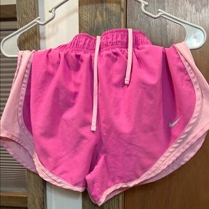 Nike Pink Athletic Shorts with Dolphin Hem